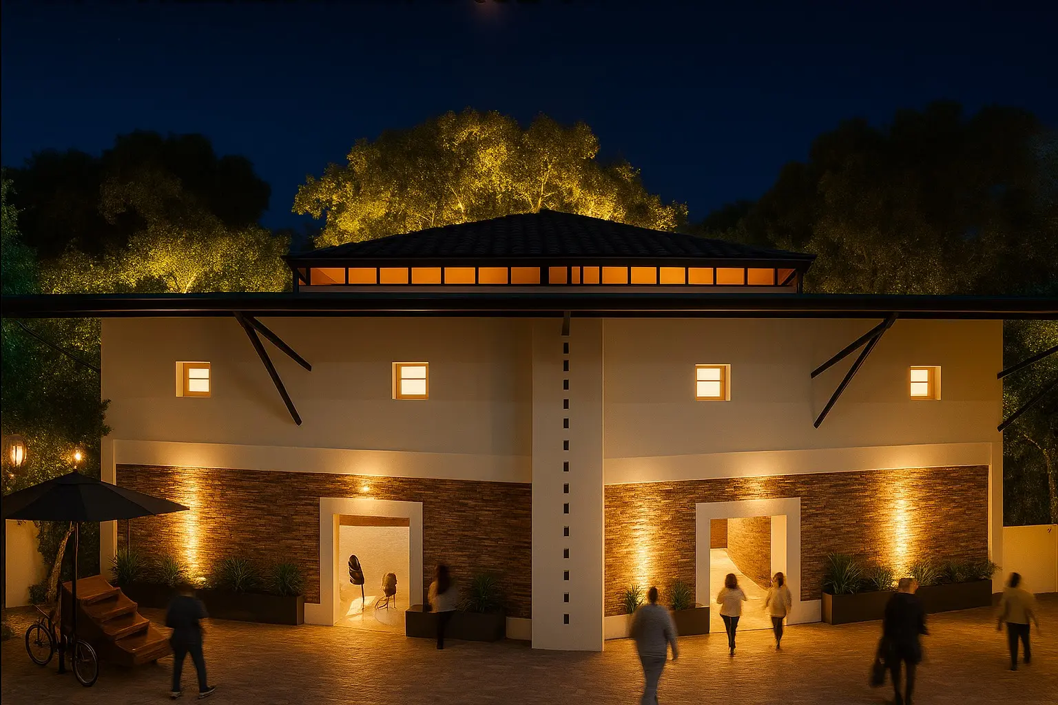 Visualización nocturna de la fachada principal del proyecto IPUIC